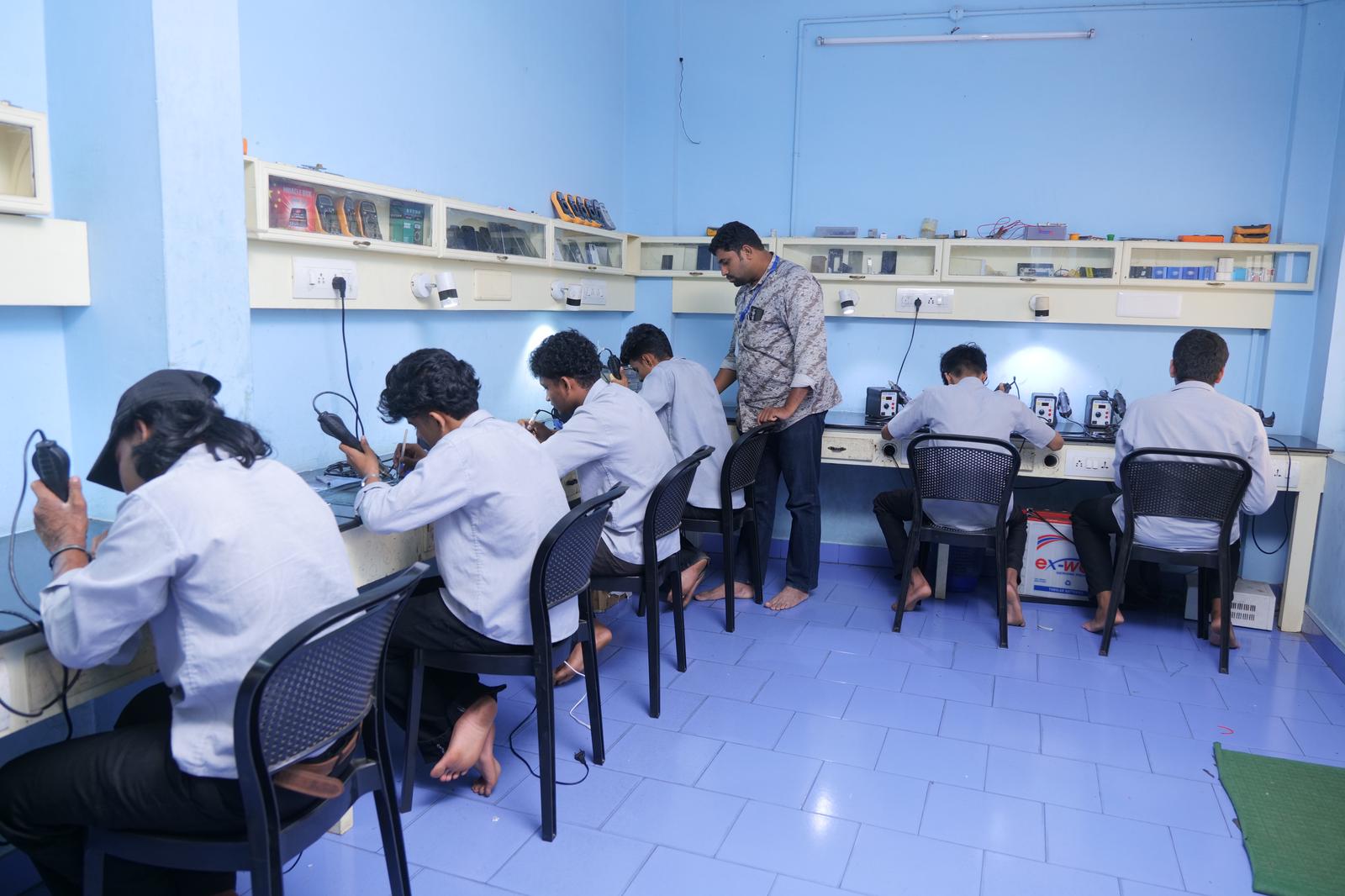 Students working in electronics lab